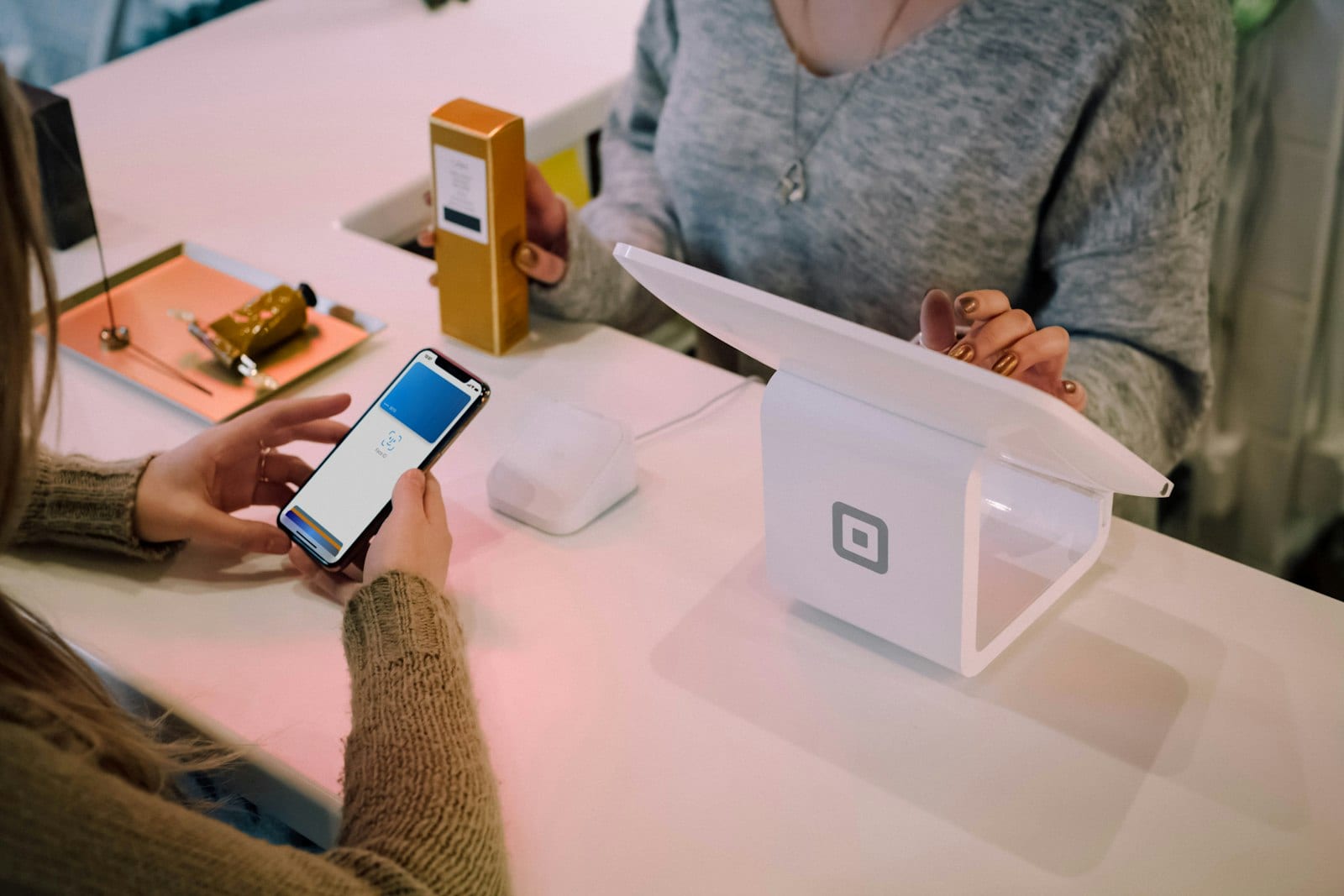 Credit cards arranged on a desk with a smartphone